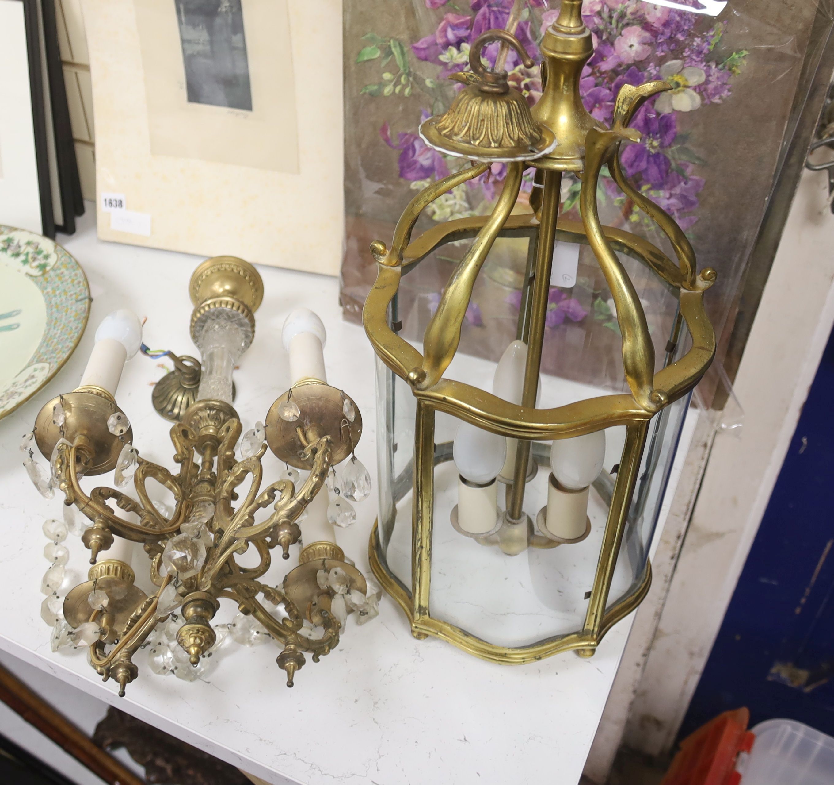 An early 20th century gilt brass hall lantern, height 49cm, and a gilt metal lustre hung electrolier